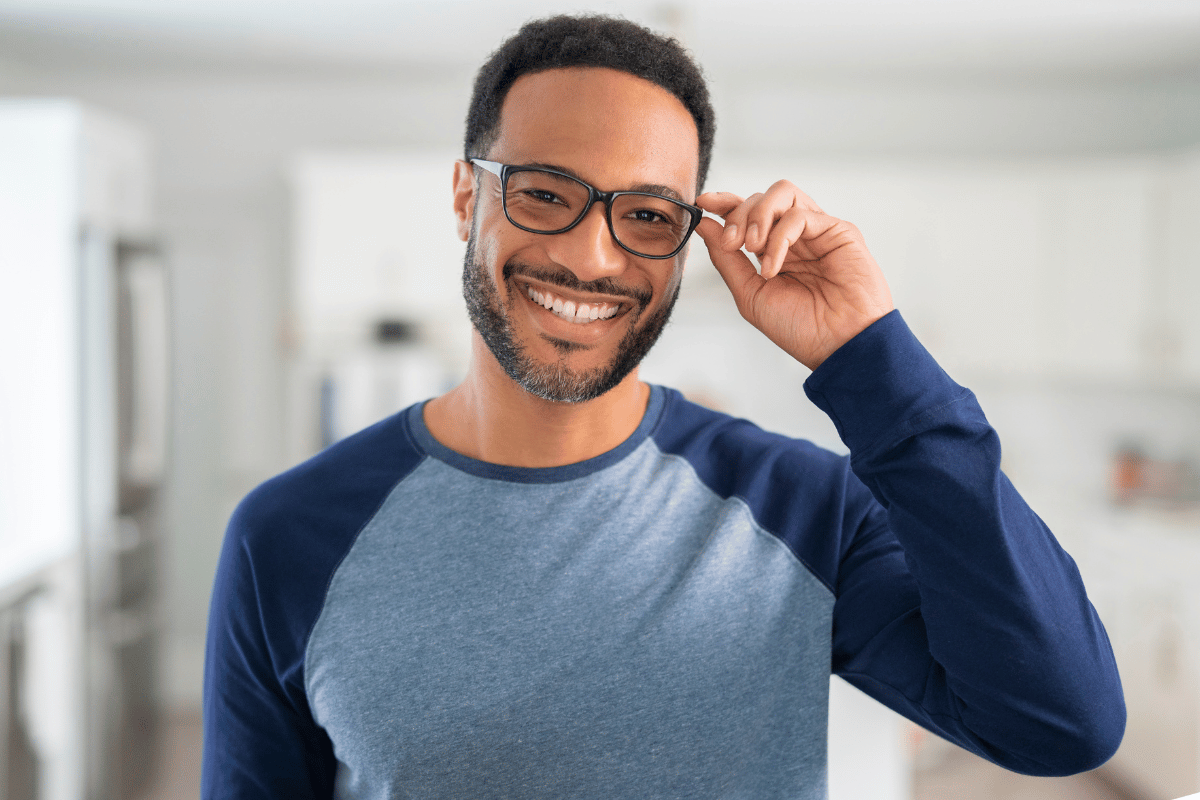 man smiling and wearing glasses with Neurolenses